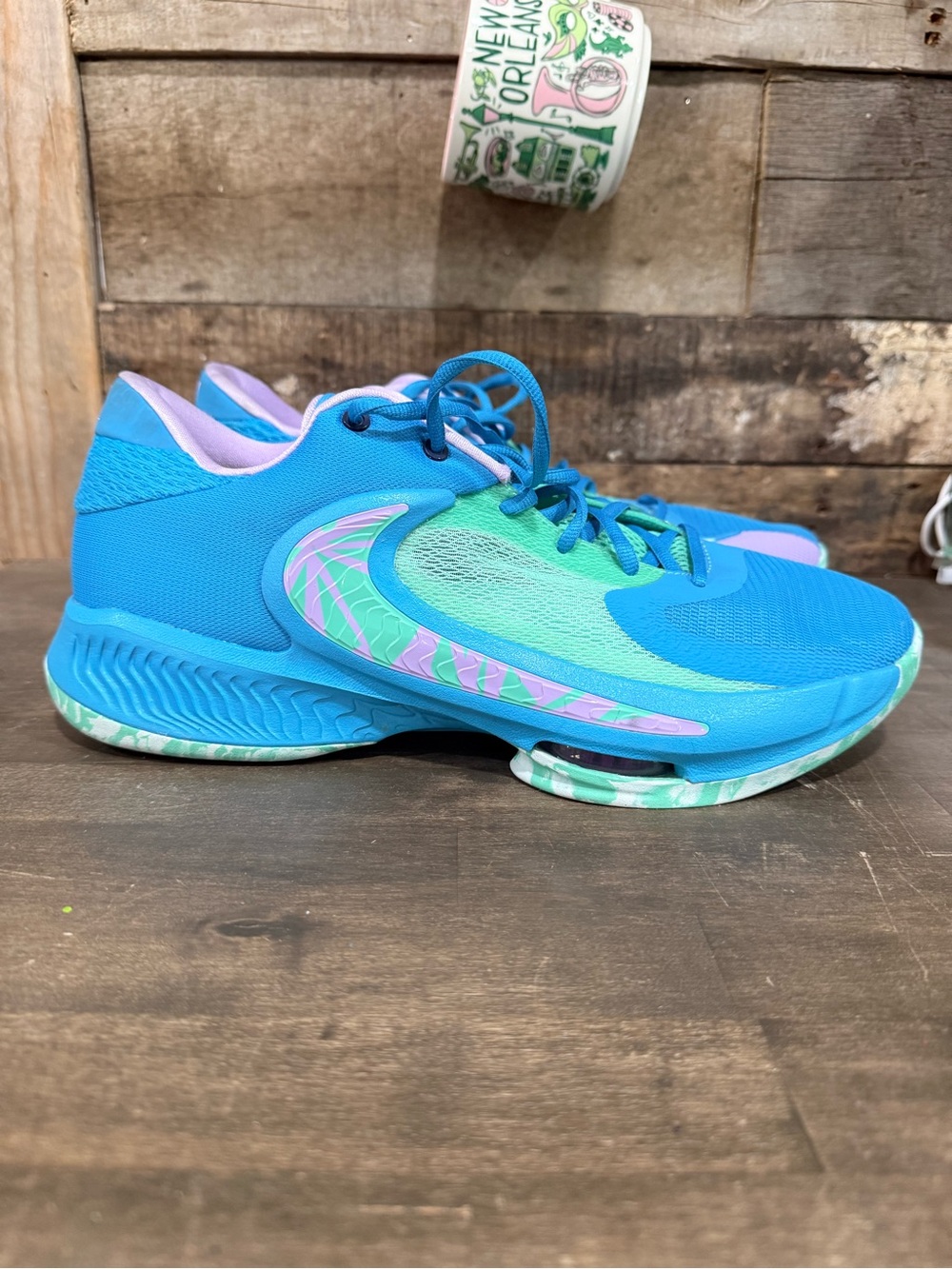Nike Women’s Blue Athletic Shoes with Mint & Lilac Accents